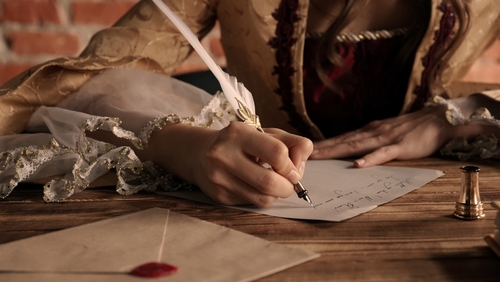 Woman writing with quill pen & ink
                      (Source: Shutterstock -
https://www.shutterstock.com/image-photo/antique-young-woman-renaissance-dress-sitting-2528361469)